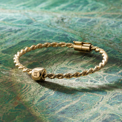 Złota bransoletka tensorowa ze złota próby 585 – Kubit Królewski 144 MHz, amulet ochronny